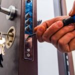 locksmith-repairing-door-lock