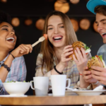 Friends trying different fast food restaurants